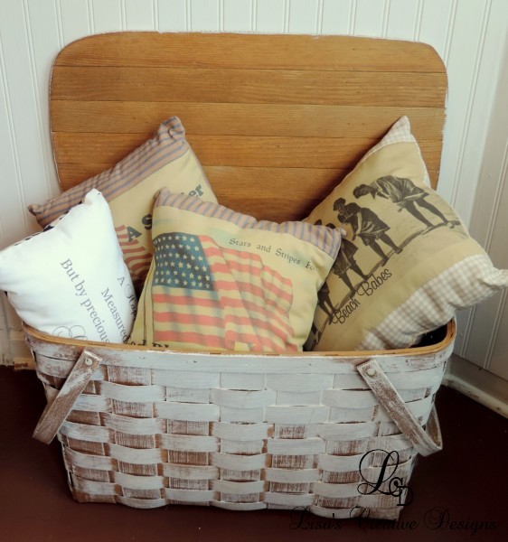 Vintage Picnic Basket Displaying An Assortment Of Pillows