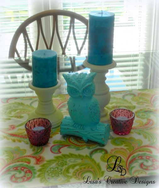 Pretty Owl and Candle Display in lieu of a traditional floral centerpiece.