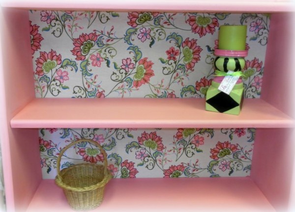 Bubble Gum Book Shelf With Floral Fabric Background