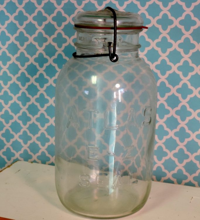 quart and pint Vintage pair of Atlas canning jars with glass lids E Z seal