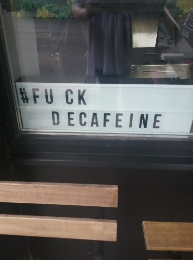 Cafe sign in Kortijk, Belgium