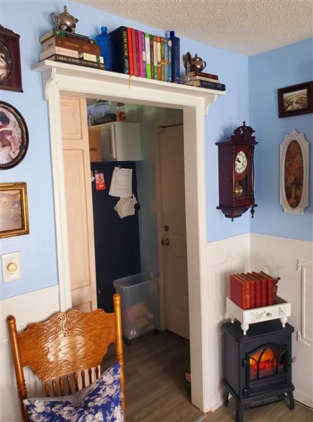 Thrifted Light Academia Home Library Makeover bookshelf over the doorway