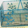 Turquoise Painted Metal Basket closeup of vine motif