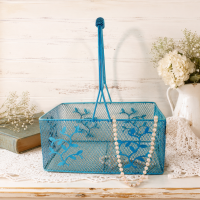 turquoise metal cottagecore basket with leaf motif