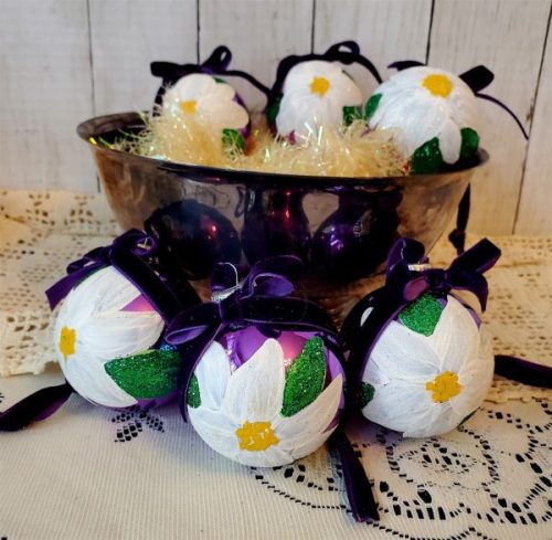 Set of six Plum Noir purple glass Christmas ornaments with hand painted white poinsettias and velvet ribbon bows