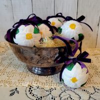 Set of six Plum Noir purple glass Christmas ornaments with hand painted white poinsettias and velvet ribbon bows