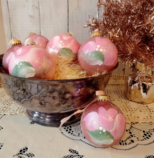 Set of seven hand-painted pink rose glitter glass Christmas ornaments styled for shabby chic and coquette holiday decor.