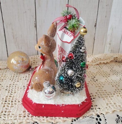 Handmade Letters to Santa retro Christmas diorama with resin deer, snowy bottle brush tree, glass ornaments, faux snow, and red wood base side view